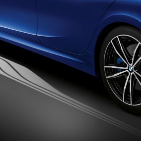 BMW 3 Series Sedan, Welcome Light Carpet. Detailed side view of the open driver's door with Welcome Light Carpet.
