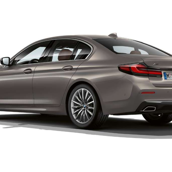 BMW 5 Series Sedan G30 Luxury Line rear BMW 5 Series Sedan 520d xDrive G30 2020 Luxury Line in Bernina Grey three-quarter rear view