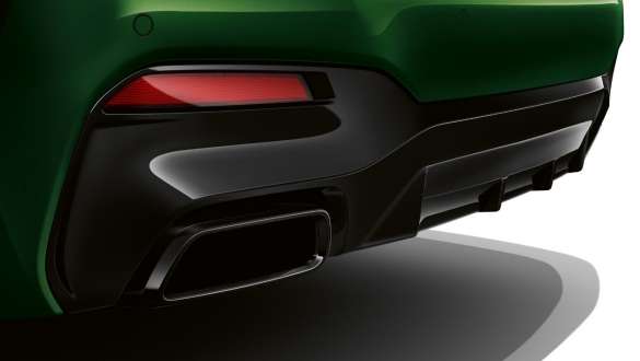 BMW M550i xDrive with trapezoid tailpipe G30 2020 BMW M550i xDrive Sedan with trapezoid tailpipe G30 LCI Facelift 2020 BMW Individual Verde Ermes metallic close-up rear