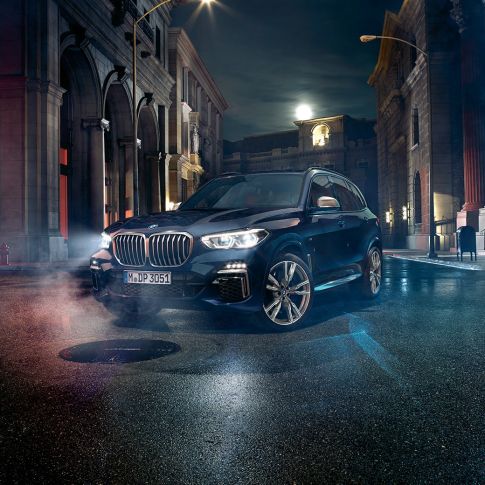 Headlights BMW X5 M50i Headlights with X Laserlight BMW X5 M50i G05 Carbon black metallic three-quarter front view