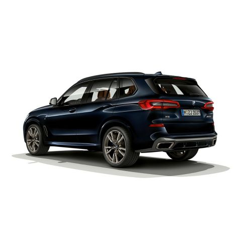 BMW X5 M50i rear view BMW X5 M50i with M roof spoiler G05 Carbon black metallic rear view