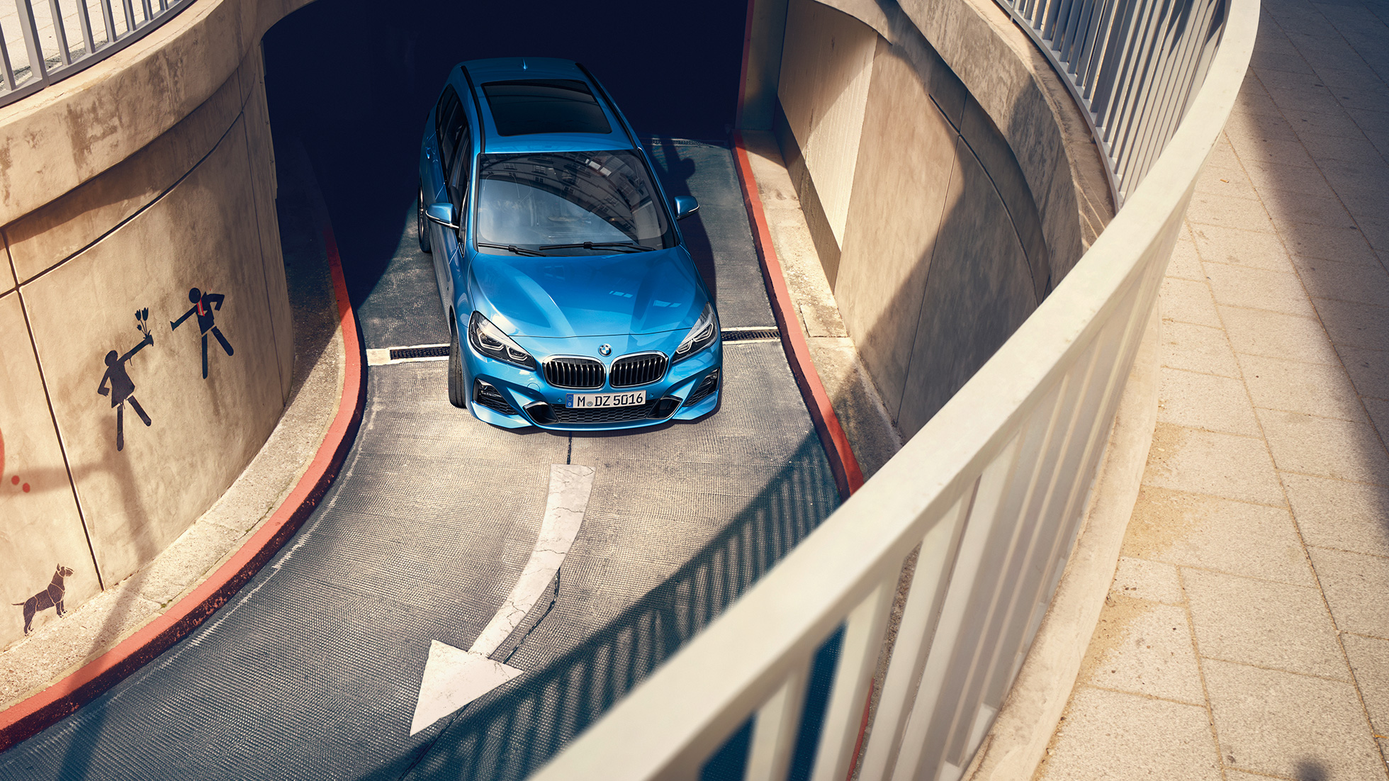 BMW 2 Series Gran Tourer driving in multi-storey car park BMW 2 Series Gran Tourer F46 2018 Misano Blue metallic bird’s-eye view driving in multi-storey car park