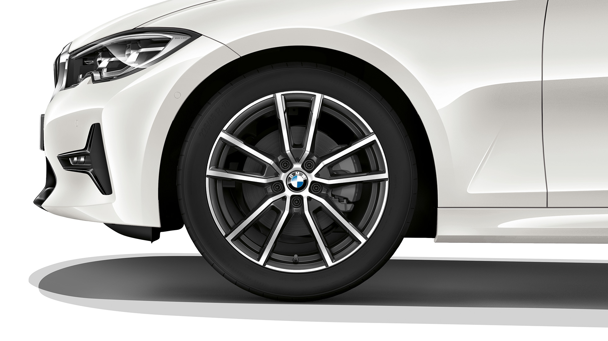 BMW 3 Series Sedan, Model Sport Line light alloy wheel. Close-up of the light alloy wheel of the BMW 3 Series Sedan with Model Sport Line equipment.