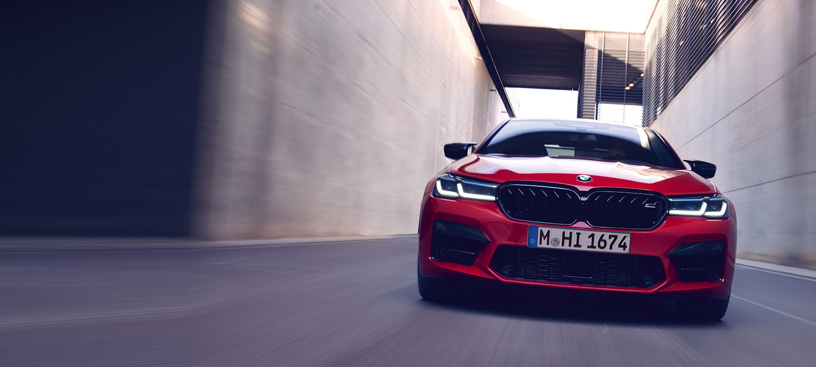 BMW M5 Competition F90 LCI Facelift 2020 front view driving BMW M5 Competition F90 LCI Facelift 2020 BMW Individual Imola Red front view driving