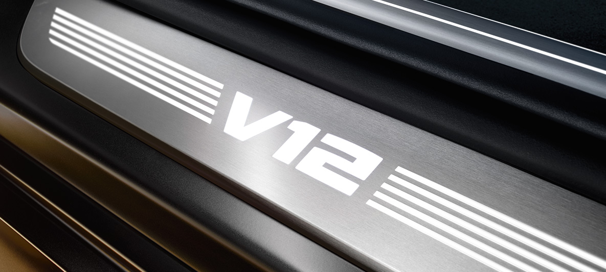 BMW M760Li xDrive Sedan G11 G12 2019 BMW entry sill with V12 lettering close-up BMW M760Li xDrive Sedan G11 G12 2019 BMW entry sill with V12 lettering close-up