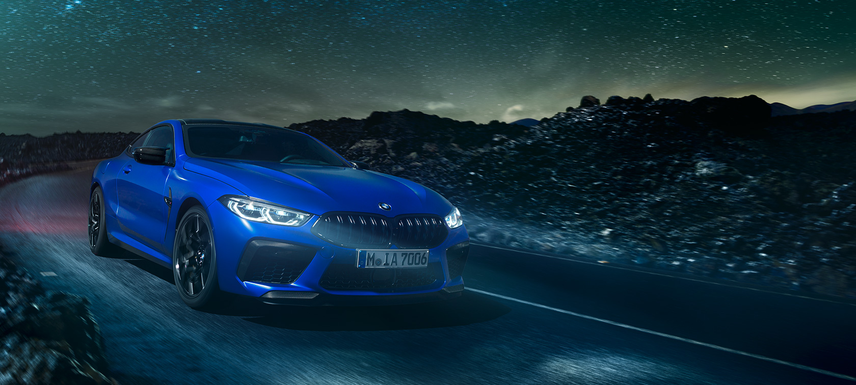 BMW M8 Competition Coupé. The first-ever BMW M8 Competition Coupé in Marina Bay Blue metallic, three-quarter front view.