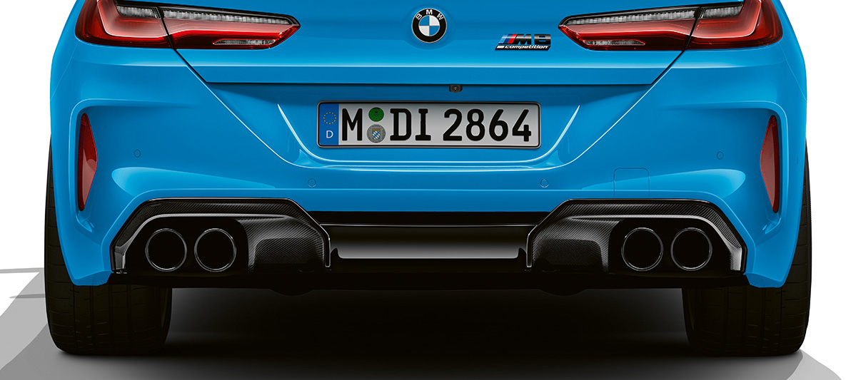 Diffuser insert made of carbon fibre reinforced plastic the BMW M8 Competition Coupé F92 LCI Facelift 2022 Daytona Beach Blue uni The BMW M8 Competition Coupé F92 LCI Facelift 2022 Daytona Beach Blue uni M Carbon exterior package rear apron close-up diffuser insert made of carbon fibre reinforced plastic