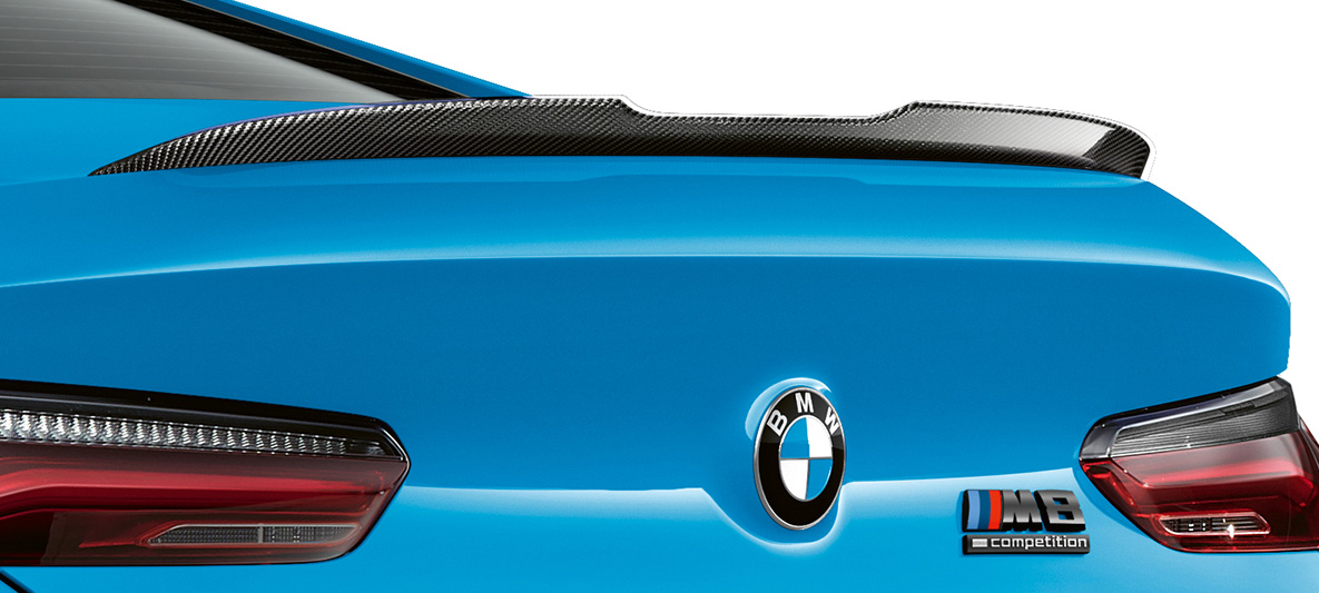 Rear spoiler carbon the BMW M8 Competition Coupé F92 LCI Facelift 2022 Daytona Beach Blue uni The BMW M8 Competition Coupé F92 LCI Facelift 2022 Daytona Beach Blue uni M Carbon exterior package rear spoiler carbon close-up