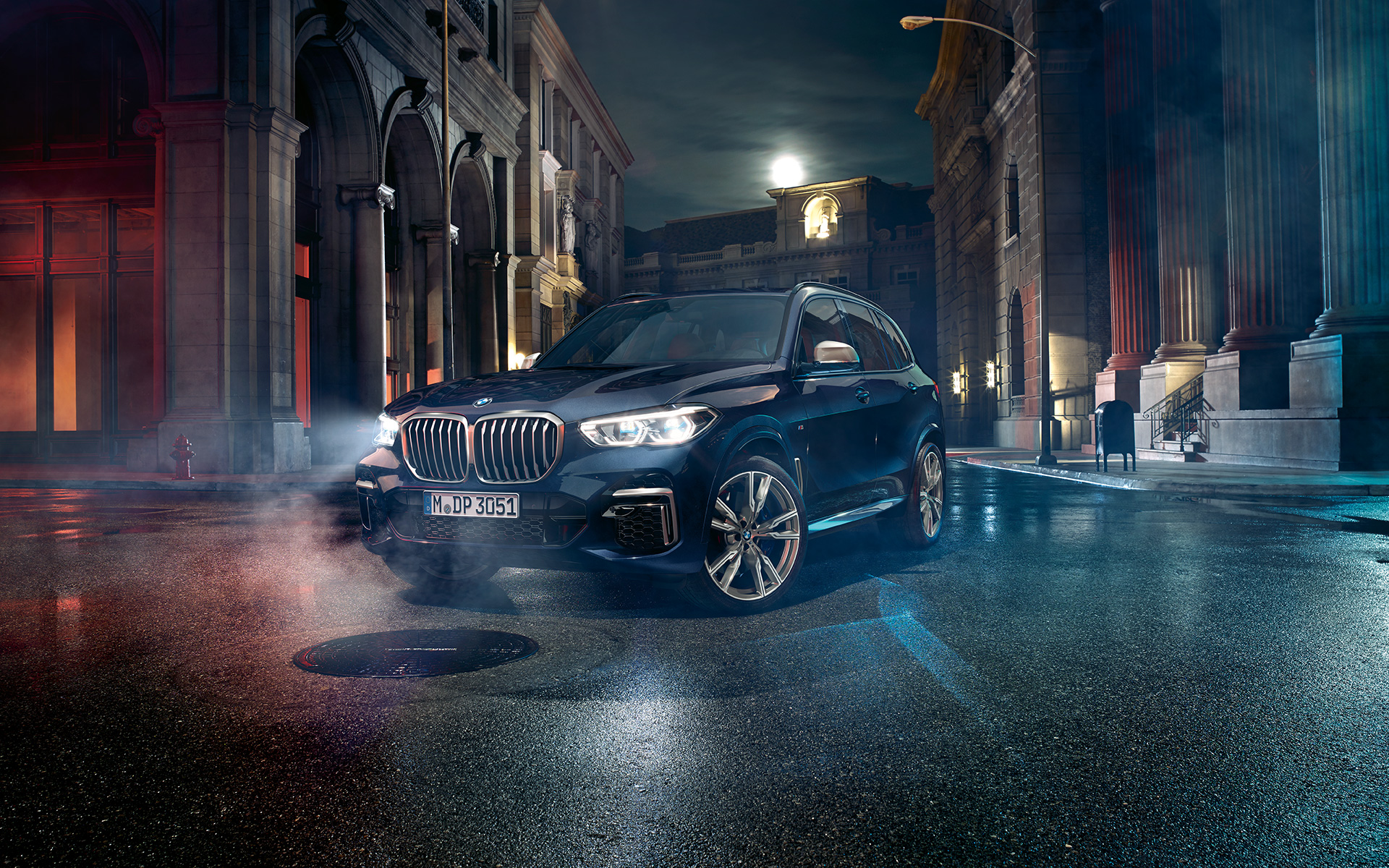 Headlights with X Laserlight BMW X5 M50i G05 2018 SUV Carbon black metallic three-quarter front view