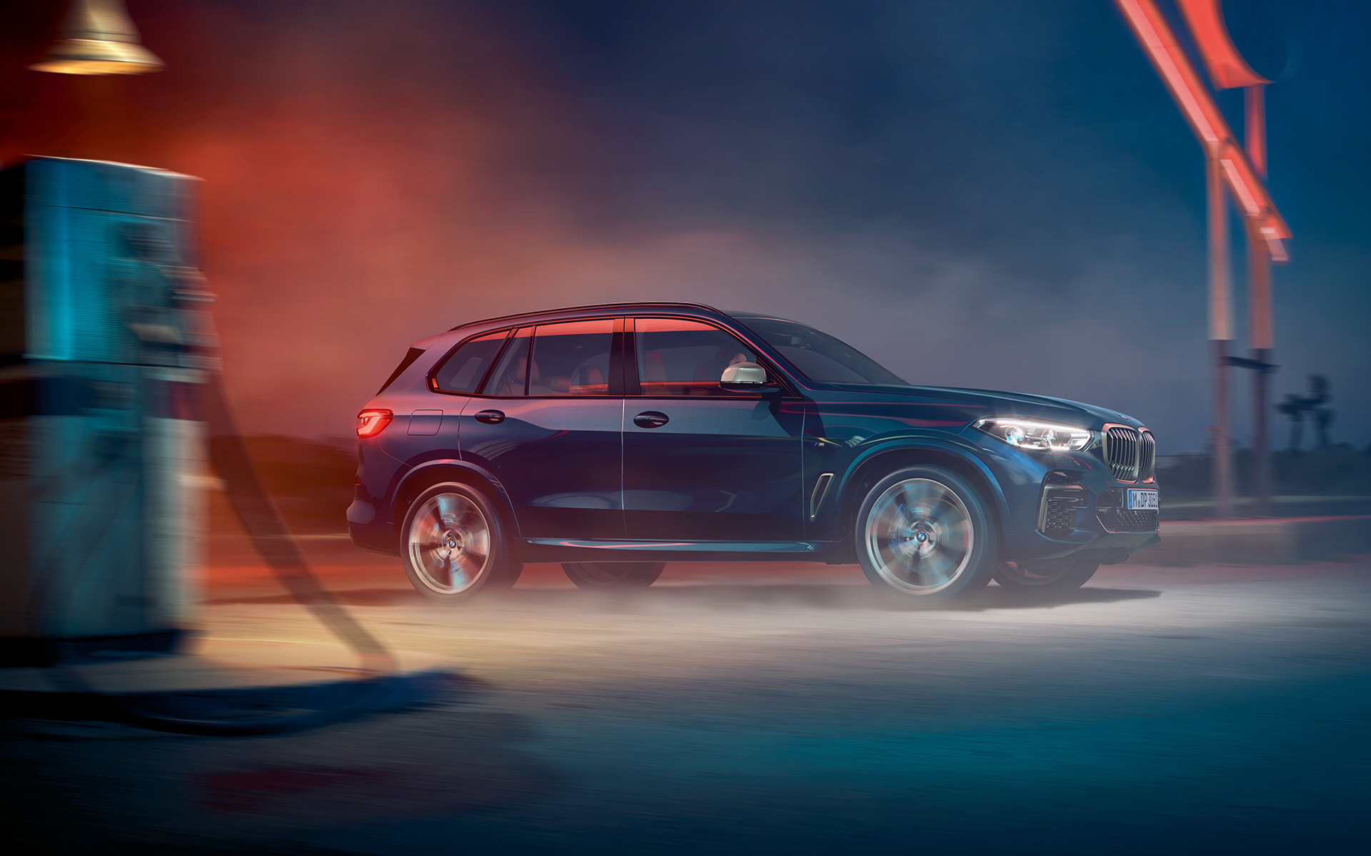 BMW X5 M50i G05 2018 SUV with M light alloy wheels Carbon black metallic side view
