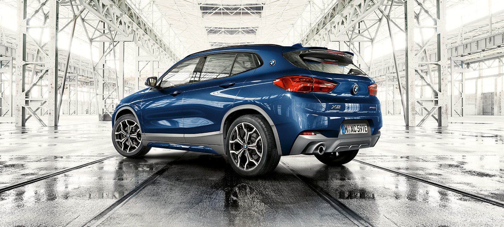 Three quarter rear view BMW X2 xDrive25e BMW X2 xDrive25e plug-in hybrid F39 2020 three quarter rear view