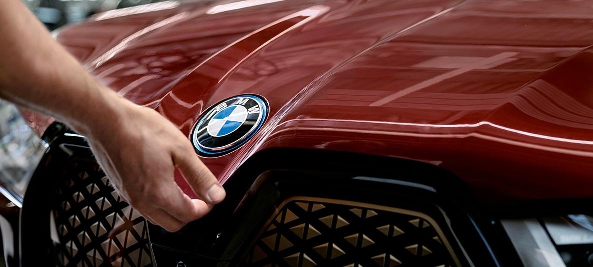 BMW vehicle checks and maintenance BMW vehicle checks and maintenance hand on BMW bonnet